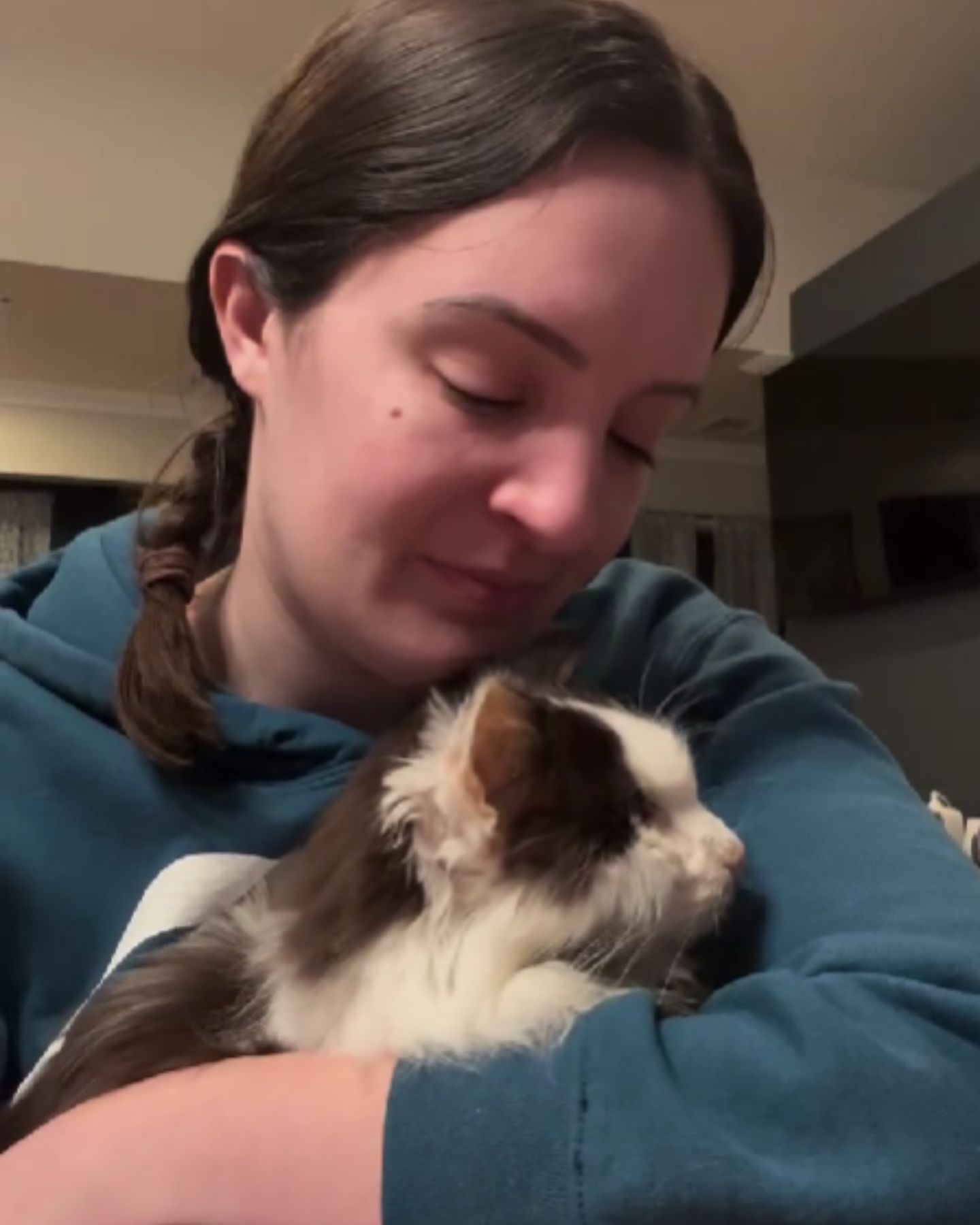 woman holding a cat