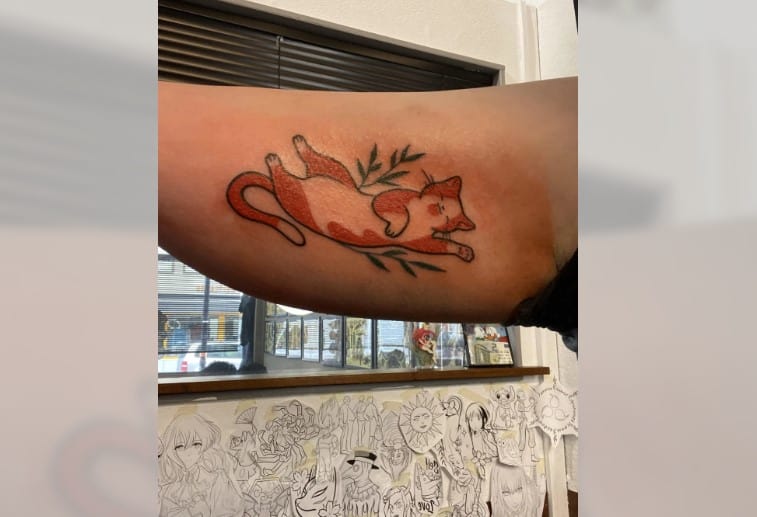 Cute Tattoo That Represents A Cat’s Nature