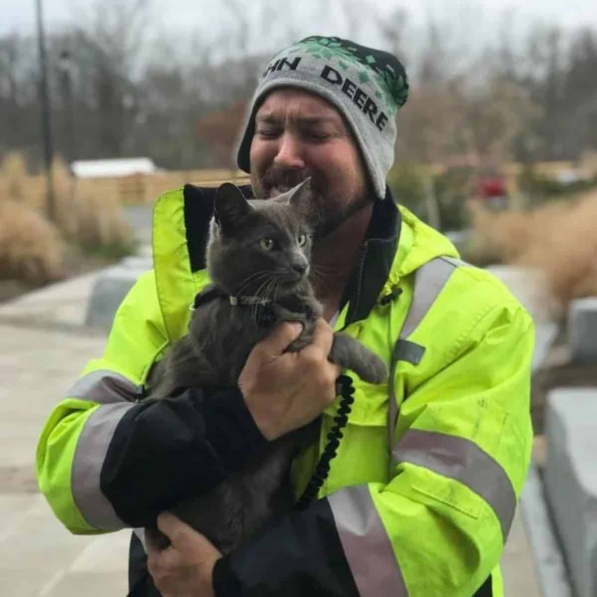 a man cries after finding his cat