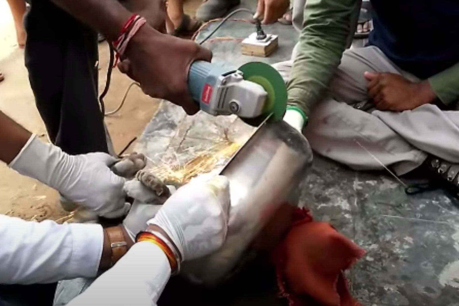 cutting the sink with a saw