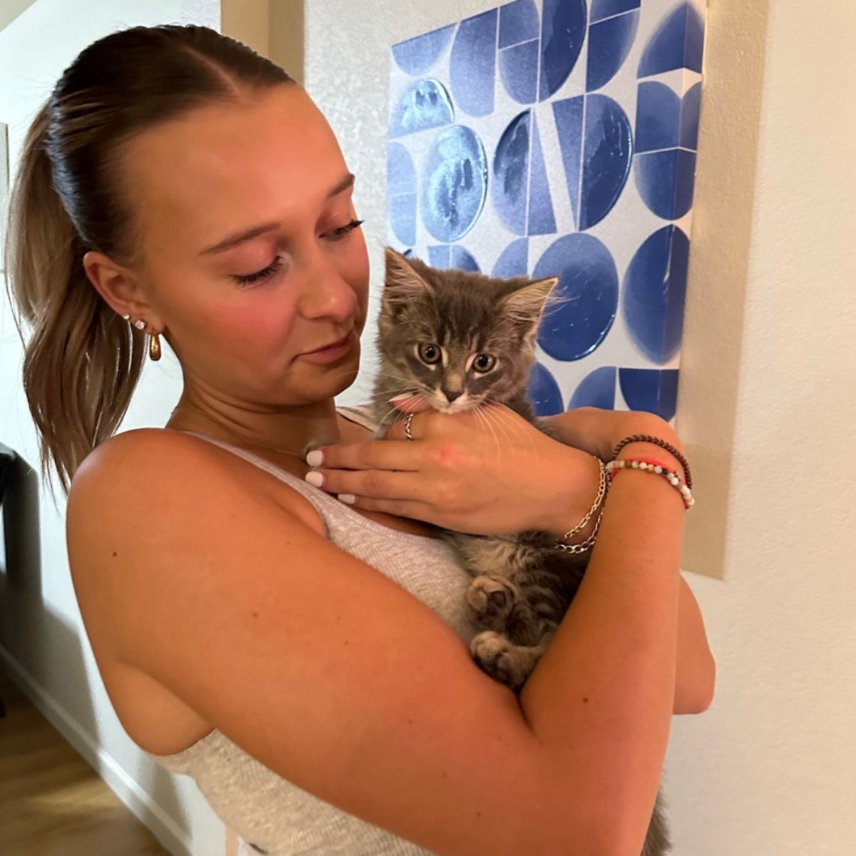 girl holding a cat