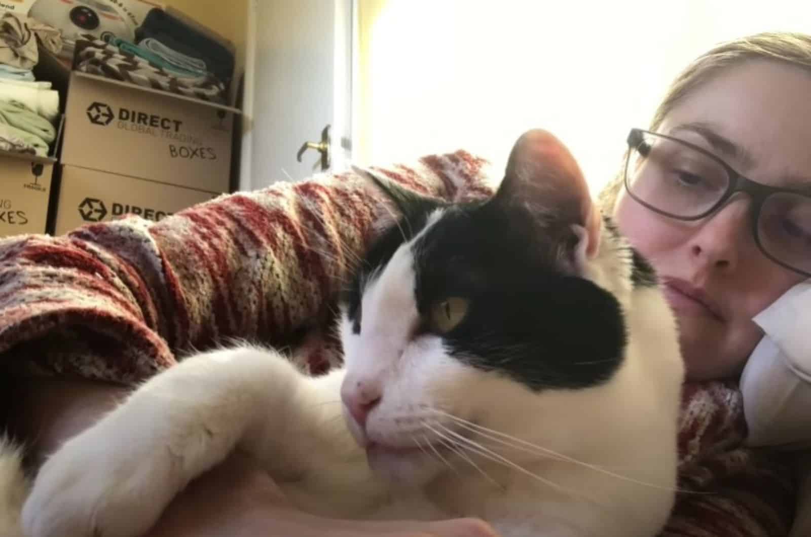 girl with glasses and cat