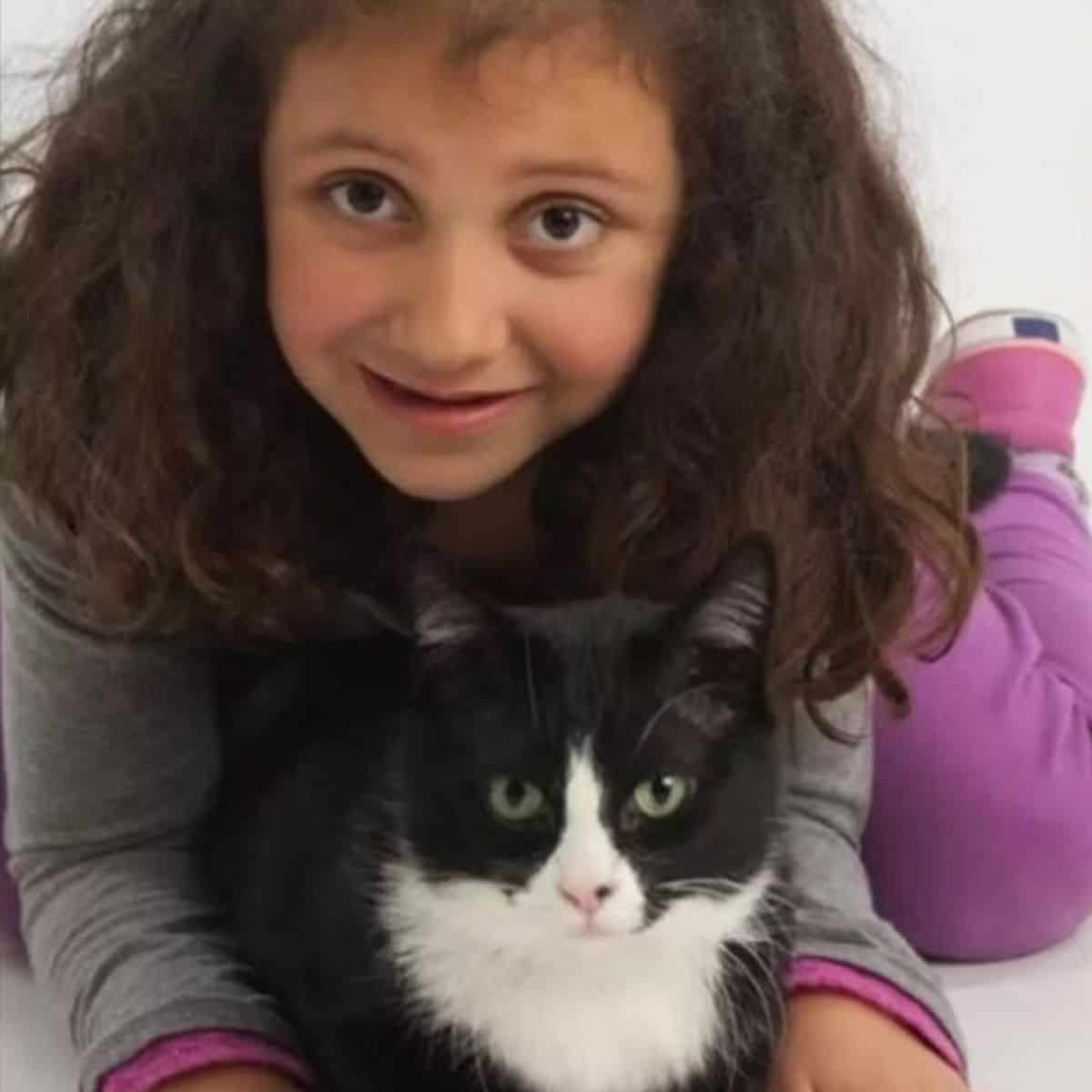 little girl with cat