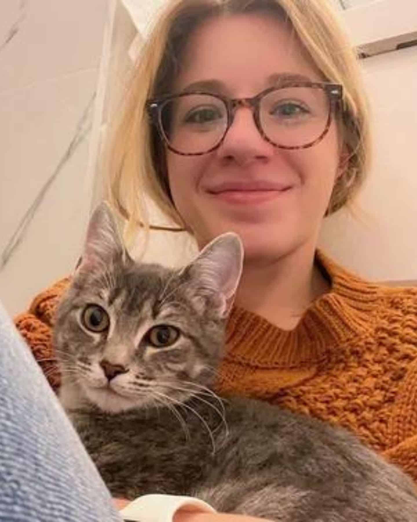 photo of woman and a cat