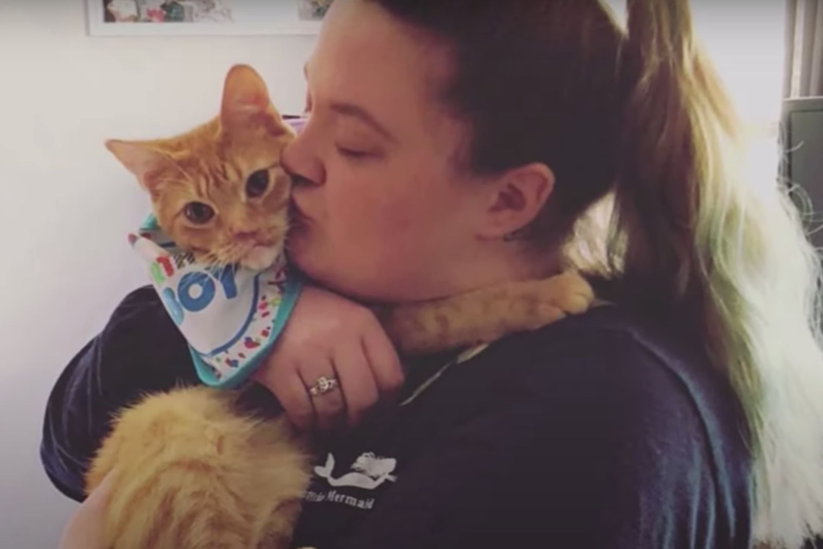 woman holding the kitten