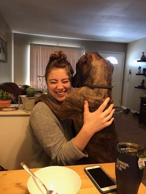 rescue dog hugs his mom every day when she gets home