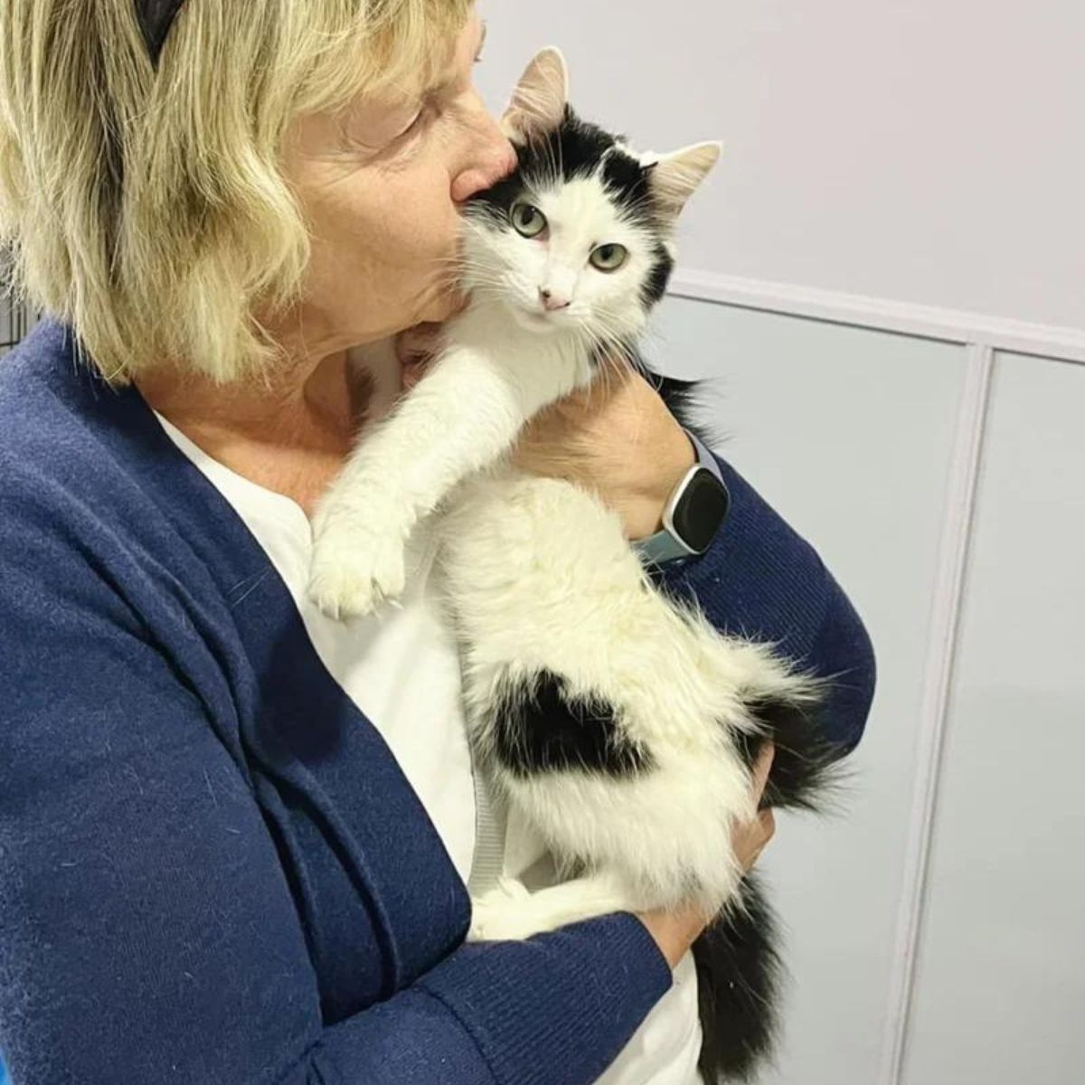 woman holding a cat